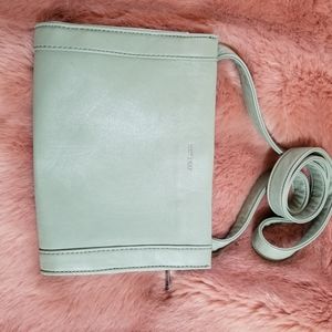Green purse [Matt & Nat]